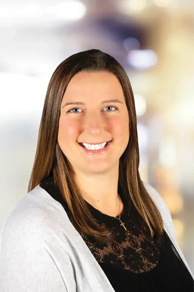 Portrait of Heather Dexter, REALTOR®.